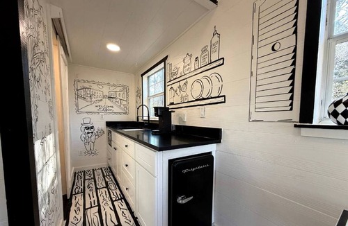 Paige Cabin | Whimsical Lakefront Tiny Home with Hand-Drawn Doodle Design Near Bastrop, Texas