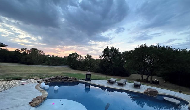 6 bedroom luxury oasis on 3 acres.