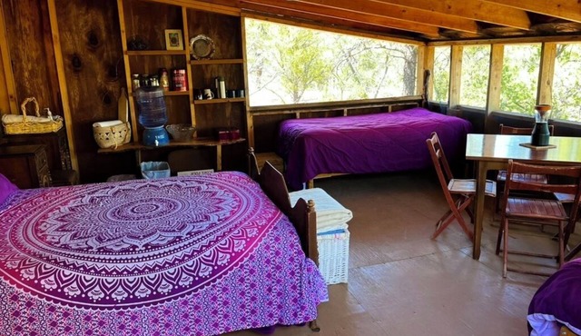 Awaken to the Crimson Sunrise in this sweet Sunrise Treehouse