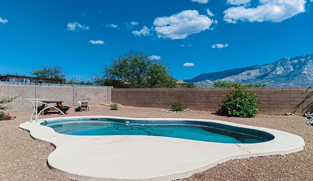 Captivating desert home with private pool, game room, grill, backyard & W/D