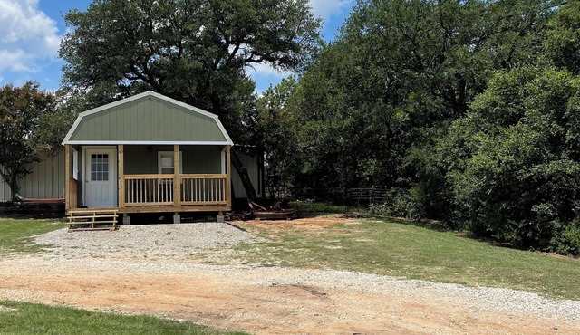 Cozy cabin with 1 bedroom and WiFi, AC & located on 40 acres with great views.