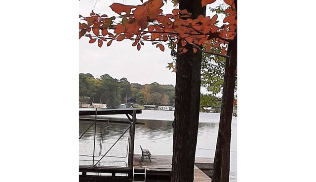 Dock Holiday is a lakefront home with hot tub. Bring your fishing pole. in Hawkins