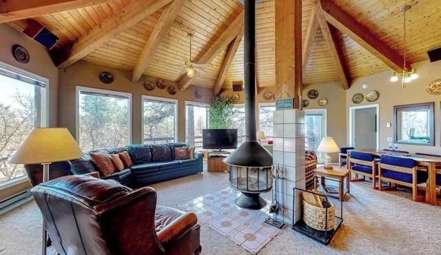 Dog-friendly home with indoor hot tub, fireplace, great views & pool access