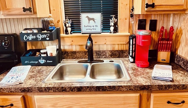 Dogs Rule at the Cabin at Camp K9, but people are welcome too.