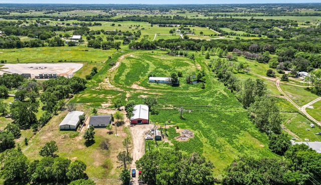 Escape to our charming ranch home on a peaceful 13-acre horse property.