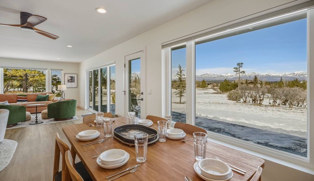 Expansive home that sleeps up to 7 on 5 acres with stunning mountain views, chef's kitchen, hot tub, entertainment room, 2 car garage, and 2 Fireplaces.