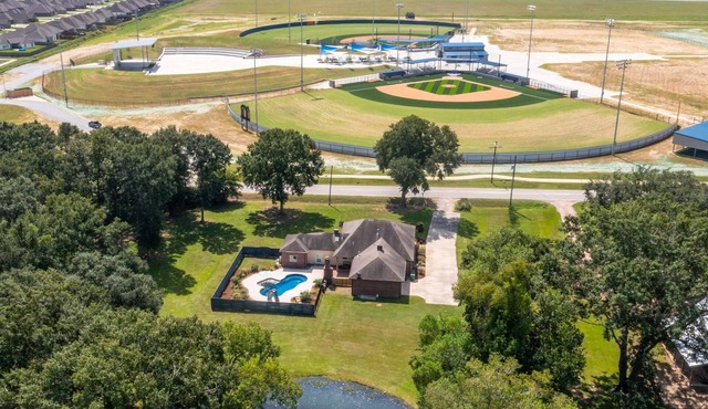 Gameday Getaway Pool Pond King Sports Complex Office Premier Host in Youngsville