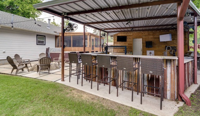 Hot Tub + Outdoor Kitchen: Stylish Home in Bryan