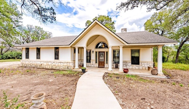 House on acreage with room to kick off your boots and relax