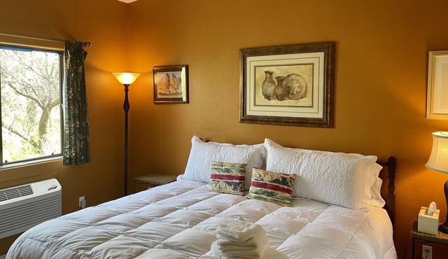 King bed room in a beautiful, well-established country inn on 14 forested acres.
