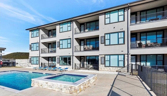 NEW! First Floor Pool side PK Lake Luxury Condo - Hot Tub, FirePit, Gym, Laundry
