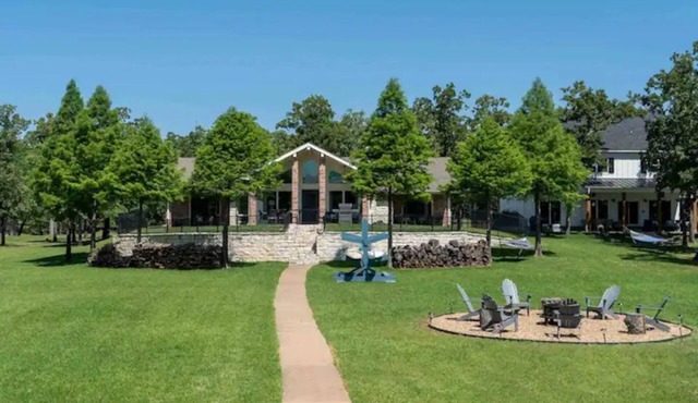 Pelican Estates Lake house at Cedar Creek Lake on wide cove in gated community.