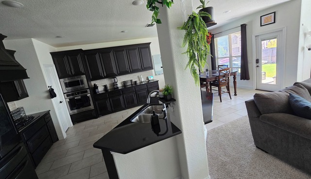 Spacious 4-bedroom Smart Home in Argyle with AC/Heat, small gym, and TVs galore
