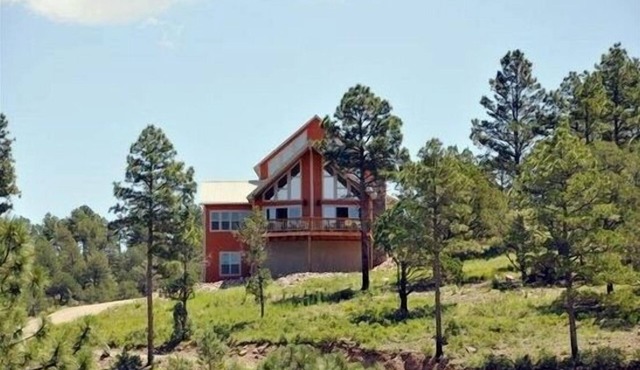 Spectacular panoramic mtn views from this majestic 3 acre luxury chalet retreat