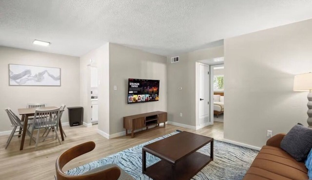 Stylish 1BR Getaway with King Bed + Free Parking + Wi-Fi