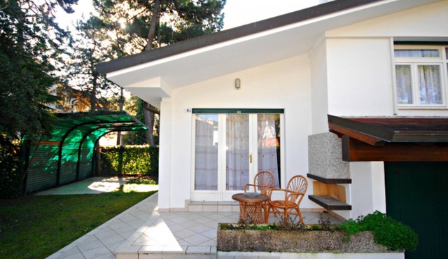 Villa with an outdoor fireplace in Lignano Sabbiadoro