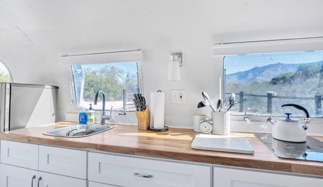 Vintage Airstream near the Catalina Mountains by RedAwning