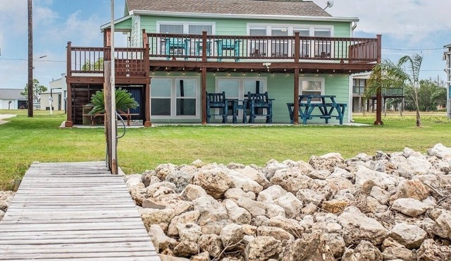 WATERFRONT, pet-friendly retreat with lighted 300’ fishing pier & boat launch!