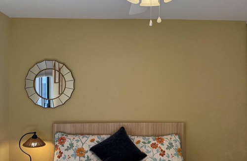 Northeast Heights House | Cozy open concept living with backyard.