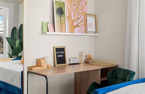 Kessler Apartment | Artsy urban retreat steps from Bishop Arts. Thoughtfully designed with creative touches, a dreamy coffee station, and a king bed you won't want to leave. Gated parking and a responsive host. Repeat guests say it's even more beautiful in person.