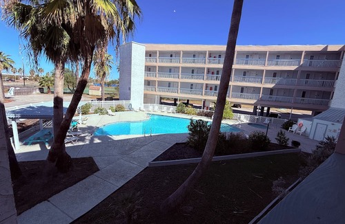 North Beach Condo | Beachside escape at Villa Del Sol—steps away to sand, pool, Aquarium & USS Lex.