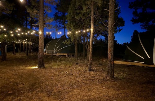 McIntosh RV Rental | Scenic Glamping Tent with Orchard & Farm Animals near Mountainair in Torreon, New Mexico