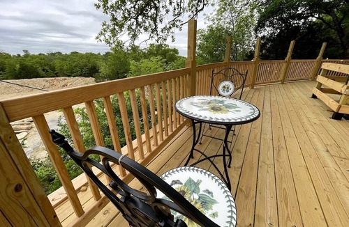 Mineral Wells House | Charming Conestoga Wagon Rental for Unforgettable Glamping in Mineral Wells, Texas
