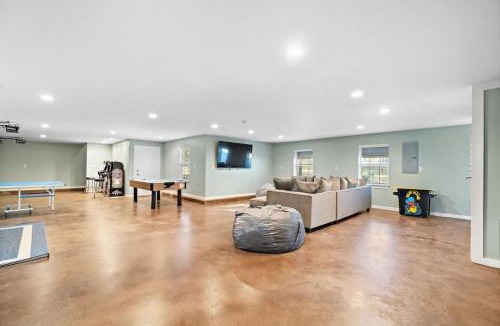 Onalaska House | Huge lakefront retreat with private pier, pool, game room and outdoor fire pit